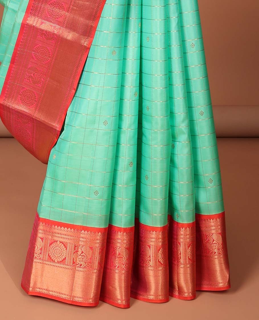 Blue checked silk saree with buttas, contrast jaal pallu & border of thilakam mokku,kathir,mayil chakram & muthu