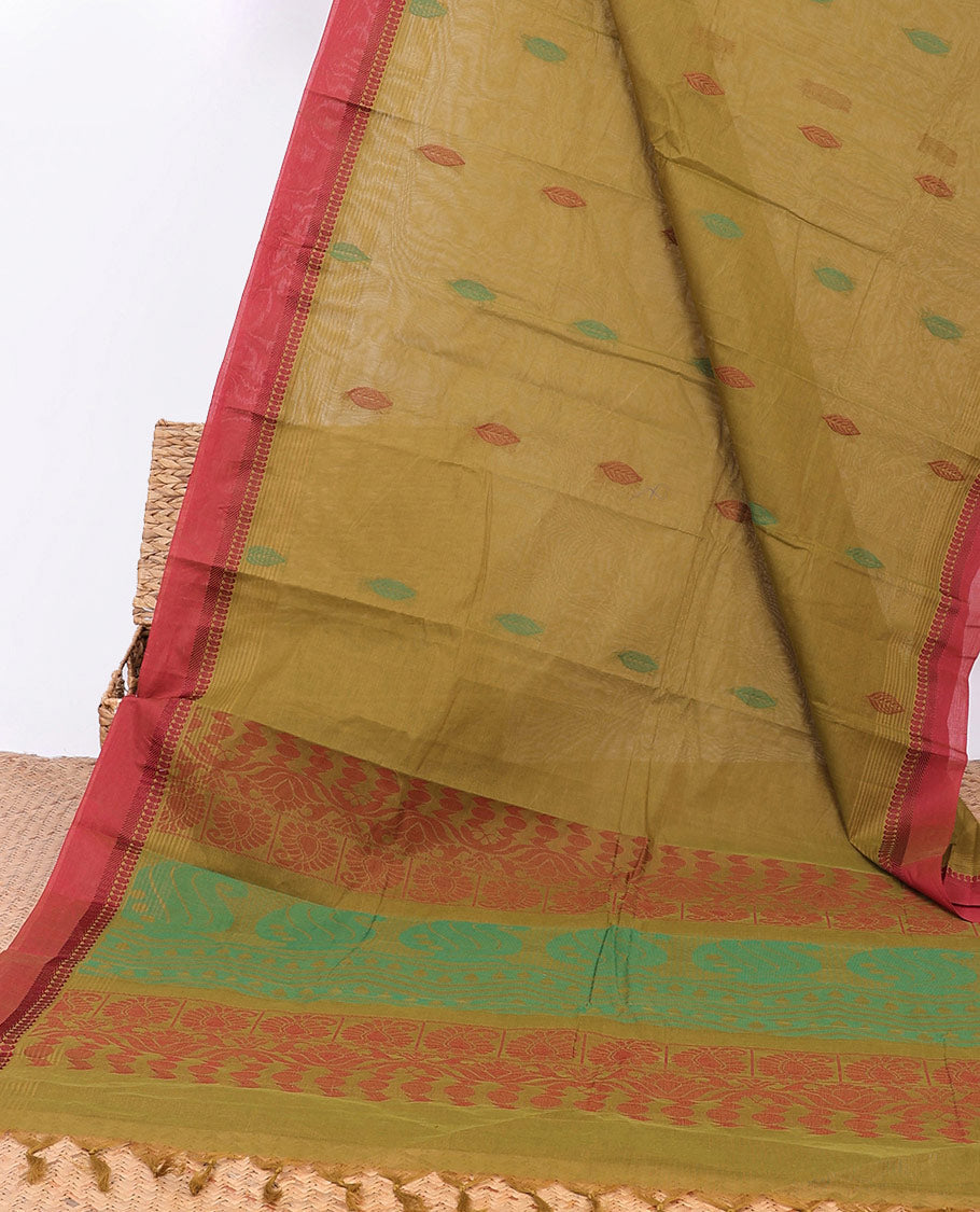 Green kanchi cotton saree with buttas, contrast paisley border & paisley pallu