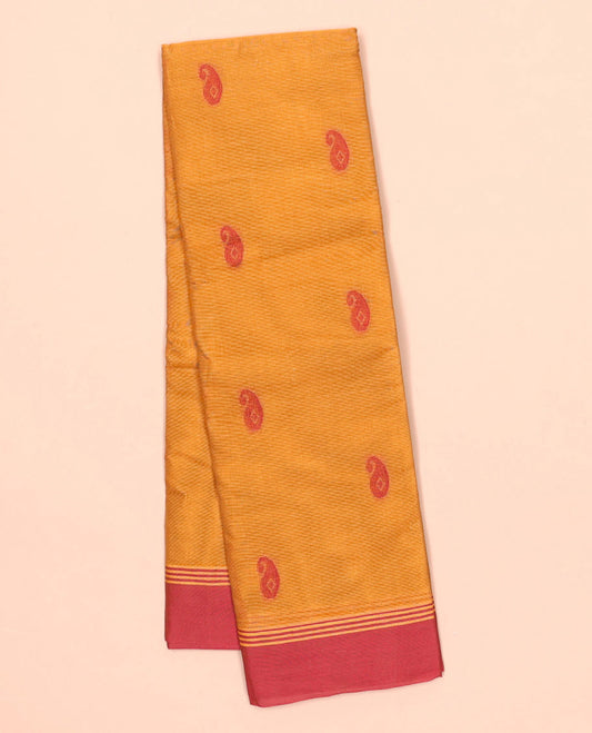 Orange kanchi cotton saree with paisley buttas, contrast border & jaal pallu