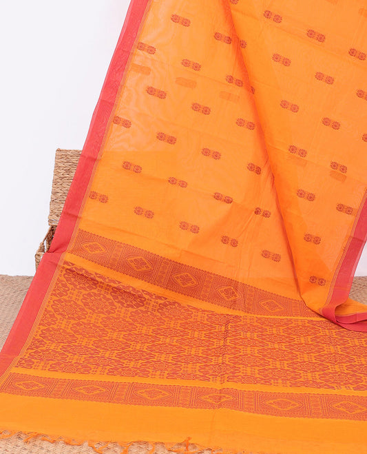 Orange kanchi cotton saree with floral buttas, contrast border & intricate pallu