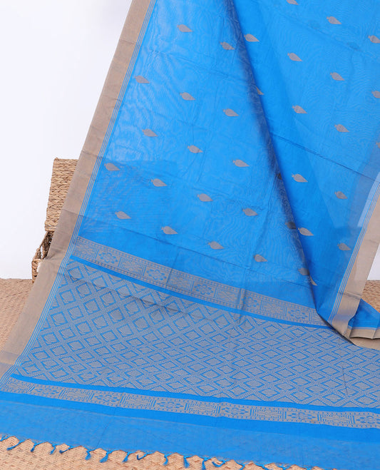 Blue kanchi cotton saree with buttas, contrast border & jaal pallu