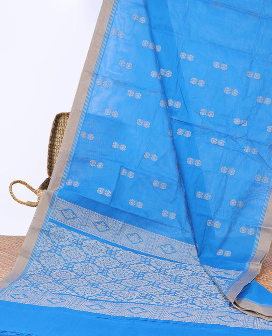 Blue kanchi cotton saree with flower buttas, contrast border & intricate pallu