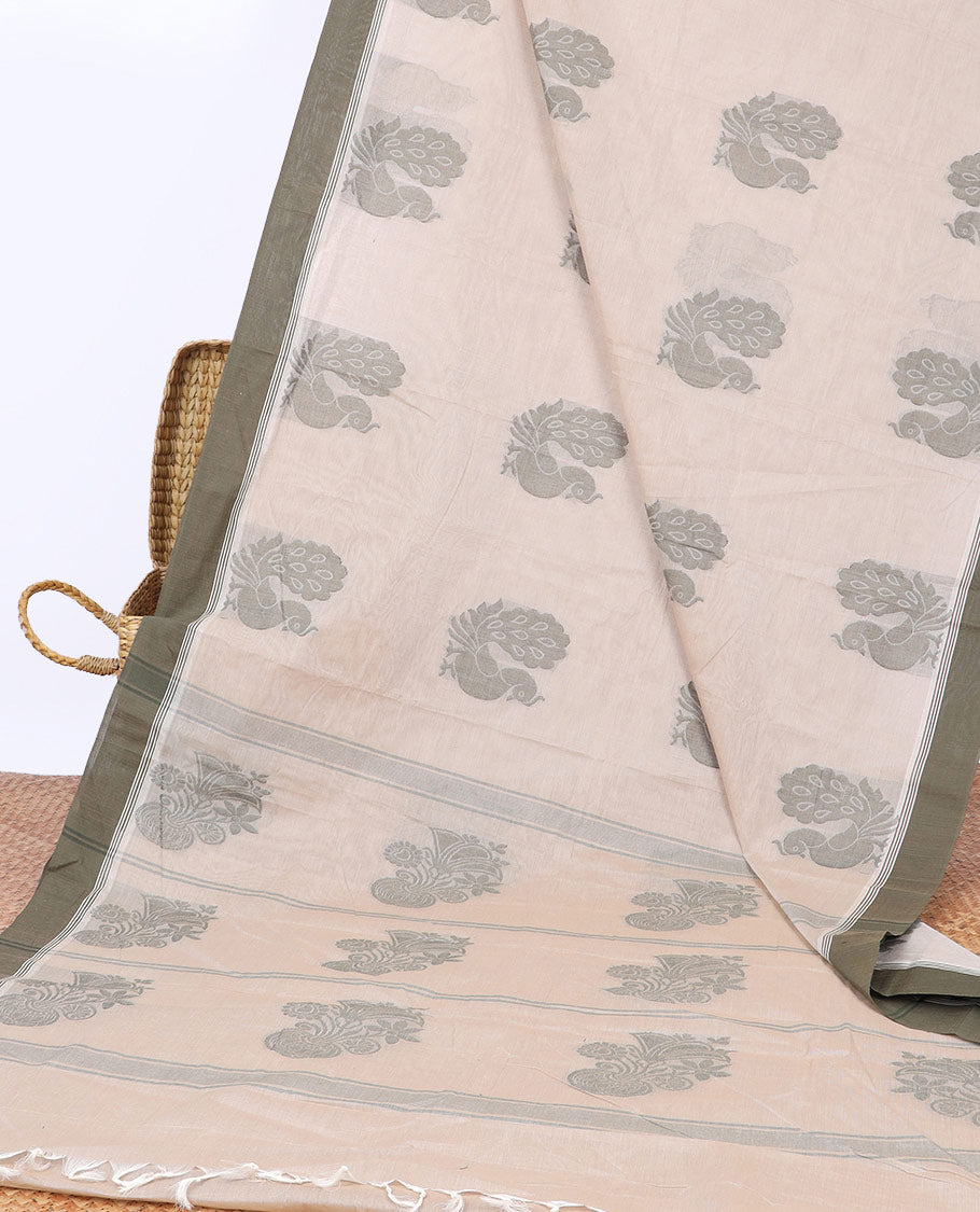 Beige kanchi cotton saree with peacock buttas, contrast border & floral design pallu
