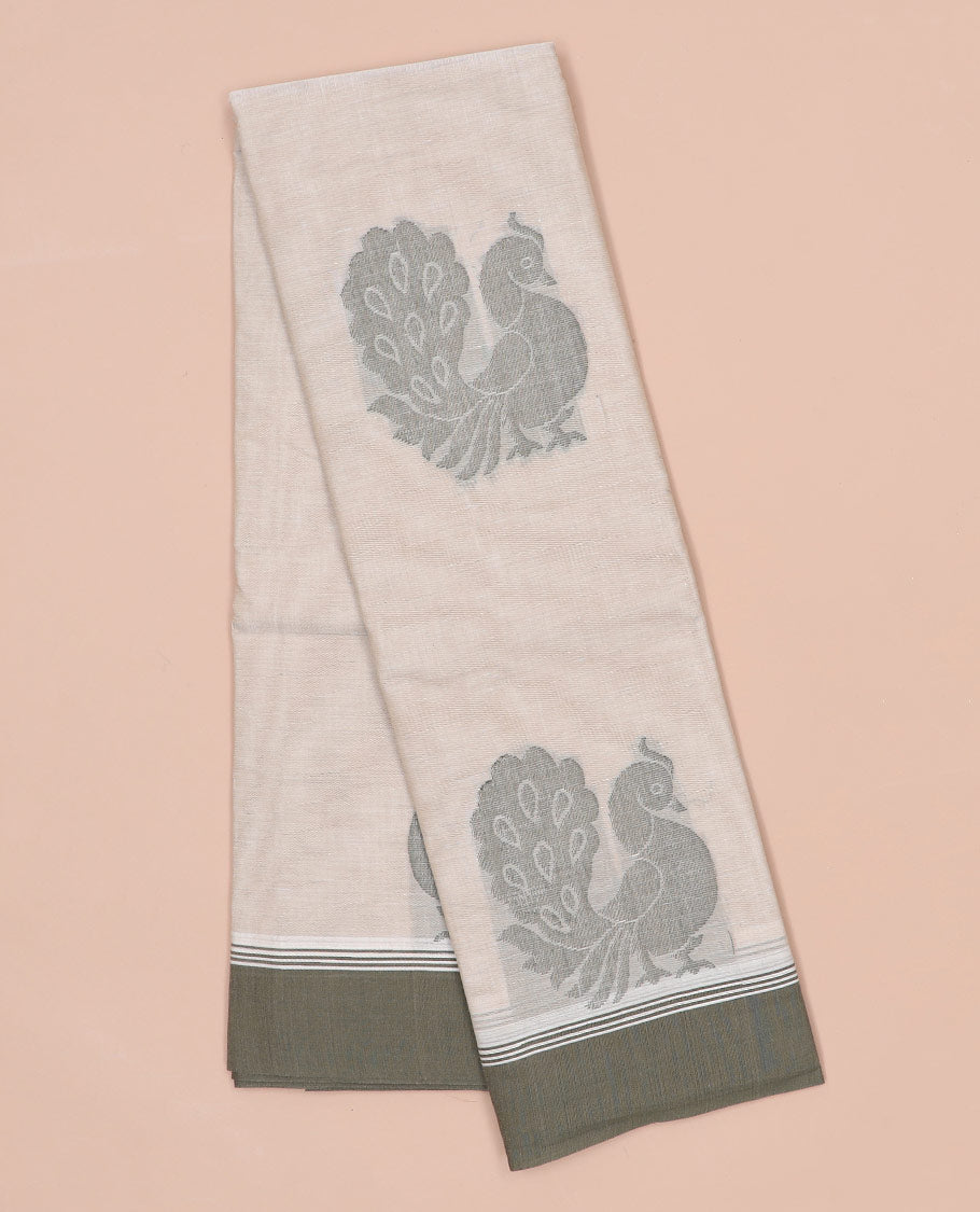 Beige kanchi cotton saree with peacock buttas, contrast border & floral design pallu