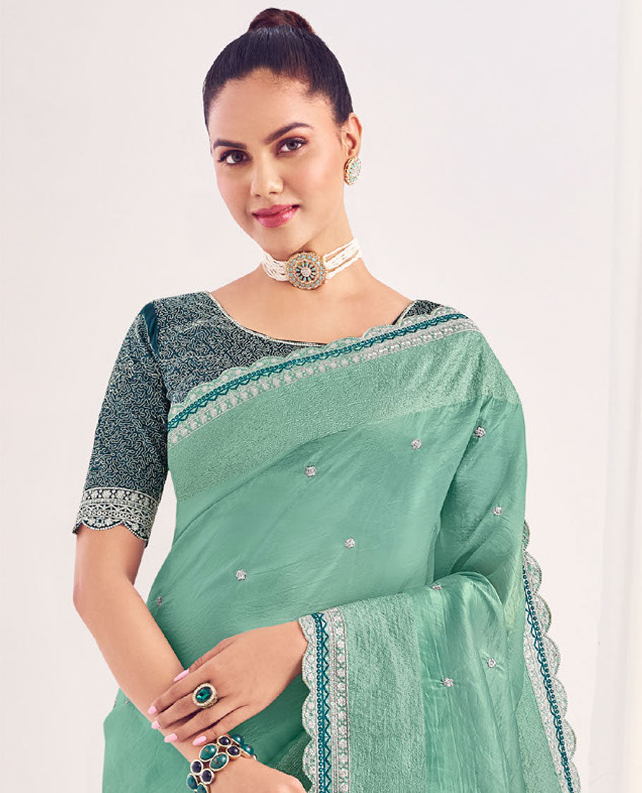 Green embroidered designer catalog saree, scallop embroidered border