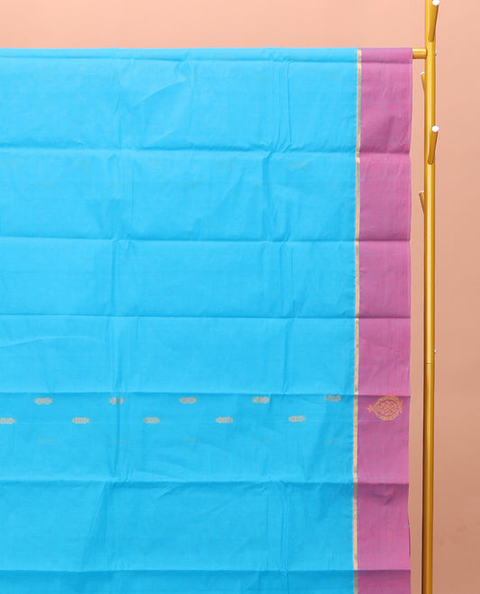 Blue Kanchi Cotton Saree, Adorned with Buttas on Its Body, Contrast Unique Motifs Border, Pallu of Intricate Design, and a Matching Blouse