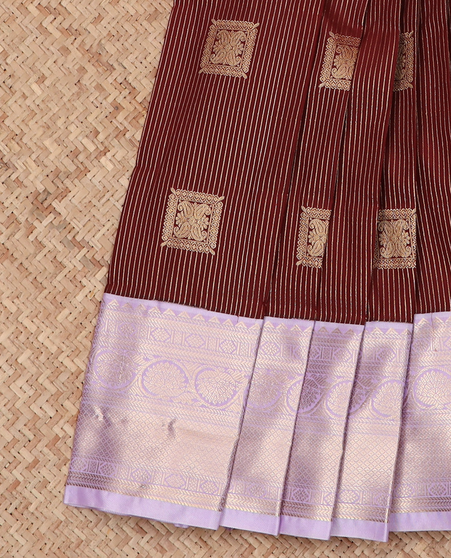 Maroon Budget Silk Saree Gracefully Embellished with Zari Buttas and Zari Stripes, Highlighted with a Contrast Traditional Zari Design Border, Featuring a Pallu of Jaal Design, and Paired with a Contrast Blouse