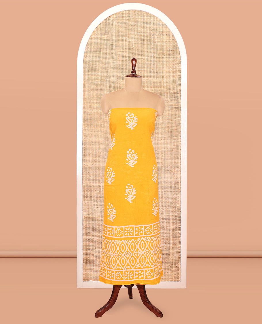 Yellow Cotton Material Chudidar, Batik Printed Top, a Matching Bottom, and Batik Print Dupatta