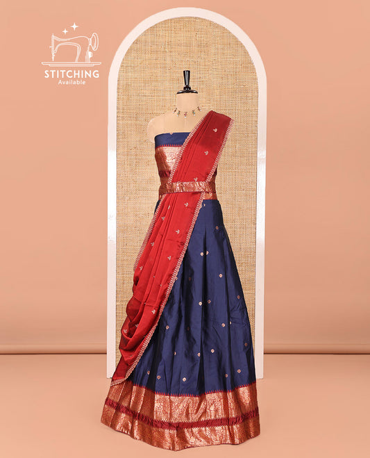 Navy Blue-Red Semi-Banarasi Half-Saree Adorned with Zari Buttas on Its Skirt, Complemented by a Contrast Traditional Zari Temple Rettai Pettu Border, Paired with a Matching Blouse, and a Satin Georgette Embroidered Scallop Dhavani