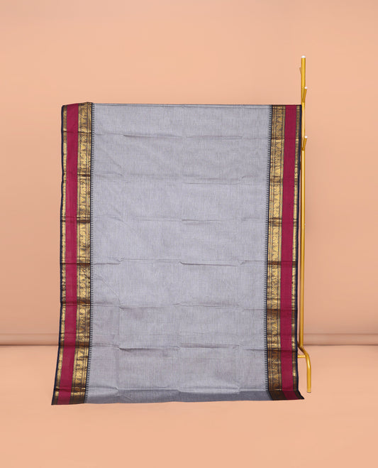 Grey Plain Chettinad Cotton Saree, Complemented by Contrast Rettai Pettu Traditional Design Temple Border, Striped Pallu, and Paired with a Matching Blouse