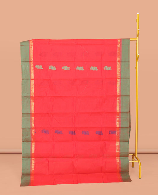 Red Kanchi Cotton Saree, Subtly Threaded with Floral Buttas All Over Its Body, Complemented by Contrast Zari Border, Pallu of Floral Designs, and Paired with a Matching Blouse