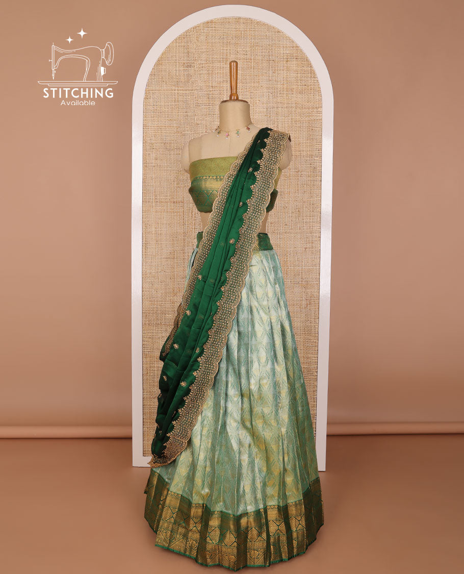 Mint green argyle design banaras half saree with contrast zari design border & zari design blouse & floral embroidered dhavani