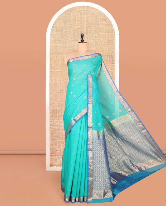 Blue Silk Cotton Saree, Adorned with Zari Buttas, Complemented by Contrast Floral Creeper Border, a Pallu of Intricate Designs, and Contrast Blouse
