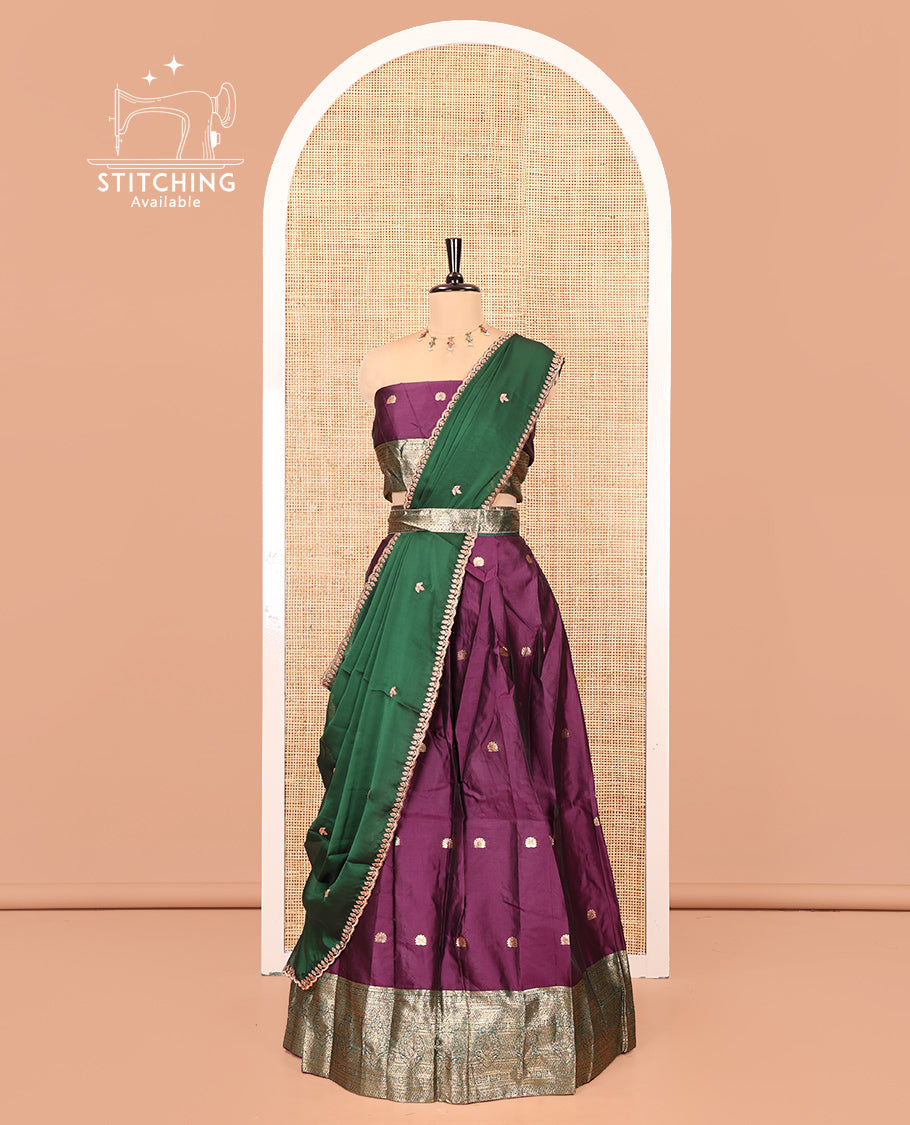 Purple-Green Semi-Banarasi Half-Saree Features Buttas Skirt, Contrast Traditional Border, Matching Blouse, and Embroidered Satin Georgette Dhavani