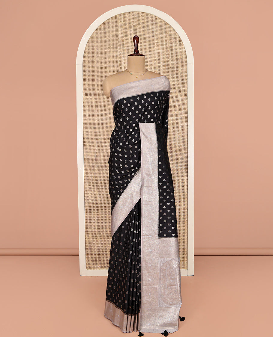 Black Dupion Silk Saree, Beautifully Bedecked with Zari Buttas, Complemented by a Contrast Zari Border, Intricately Designed Pallu, and Has a Contrast Blouse