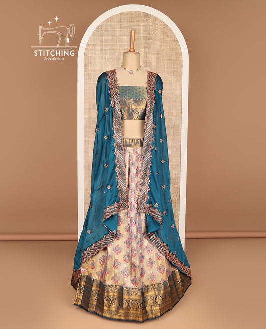 Cream floral buttas banaras half saree with contrast zari design border , zari design blouse & floral zari design dhavani