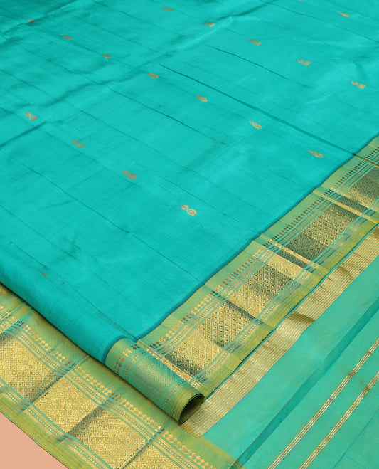 Blue Kanchipuram Silk Saree, Woven with Zari Buttas, Complemented by a Contrast Border of Panner Sombu, Banaras, Muthu, and Mayil Kann Design, Pallu of Zari Design, and No Blouse