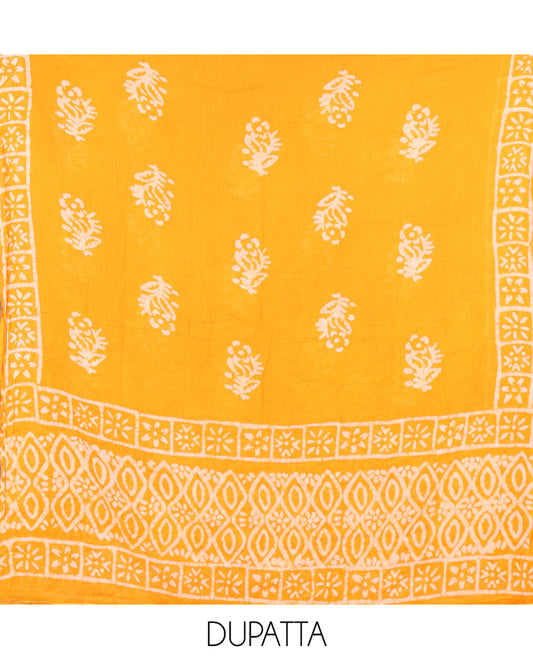 Yellow Cotton Material Chudidar, Batik Printed Top, a Matching Bottom, and Batik Print Dupatta