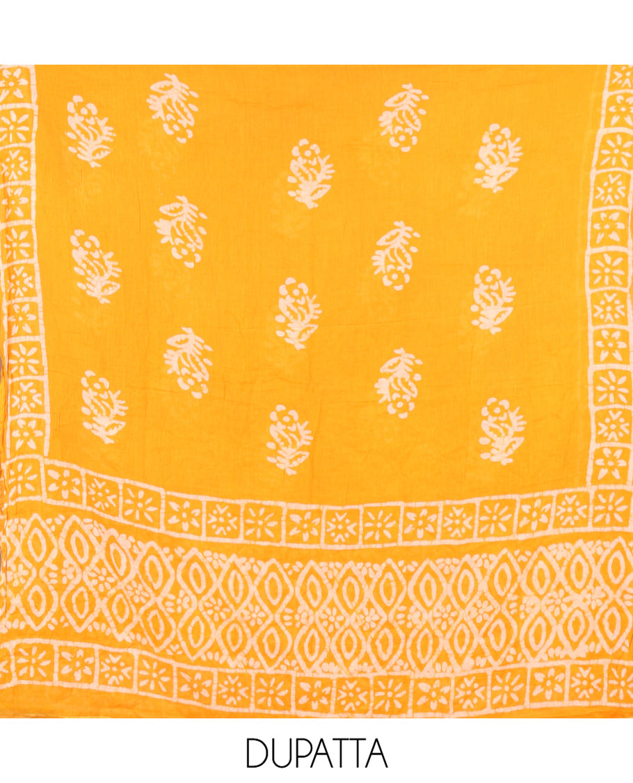 Yellow Cotton Material Chudidar, Batik Printed Top, a Matching Bottom, and Batik Print Dupatta