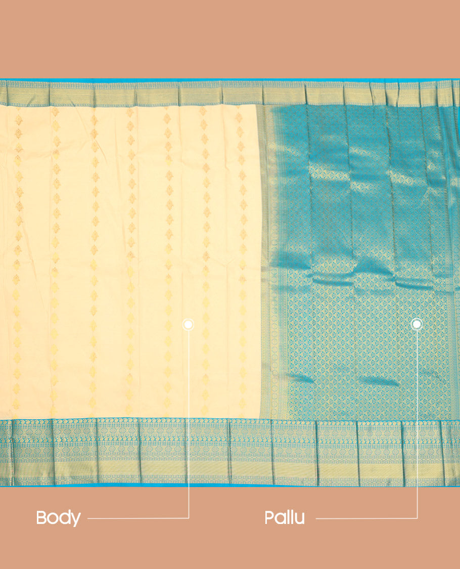 Cream Budget Silk Saree, Mesmerized with Zari Buttas on Its Body, Complemented by a Contrast Traditional Zari Design Border, Pallu of Ogee Patterns, and Paired with a Contrast Blouse
