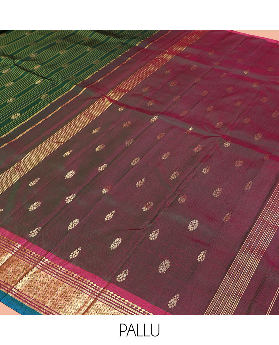 Green Kanchipuram Silk Saree, Adorned with Stripes and Zari Buttas, a Contrast One-Sided Border of Panner Sombu, Banaras, Muthu, and Jaal Design, Zari Design Pallu, and No Blouse