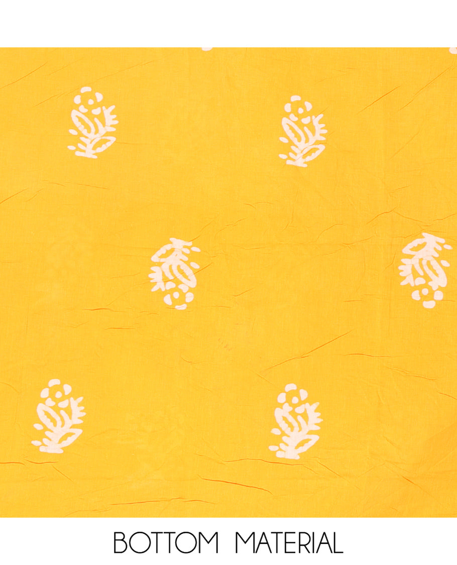 Yellow Cotton Material Chudidar, Batik Printed Top, a Matching Bottom, and Batik Print Dupatta