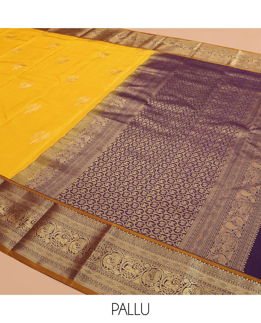 Yellow Vasundhara Lite Silk Mix Saree, Sparsely Woven with Zari Buttas, a Contrast Border of Mayil and Yaali Designs, Grand Pallu, and a Contrast Blouse