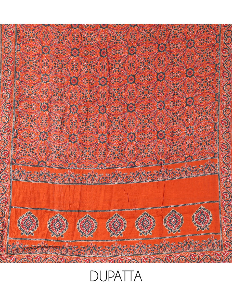 Rust Semi-Silk Material Chudidar Set Features Neck-Embroidered Top, a Santoon Bottom, and an Ajrakh Printed Dupatta