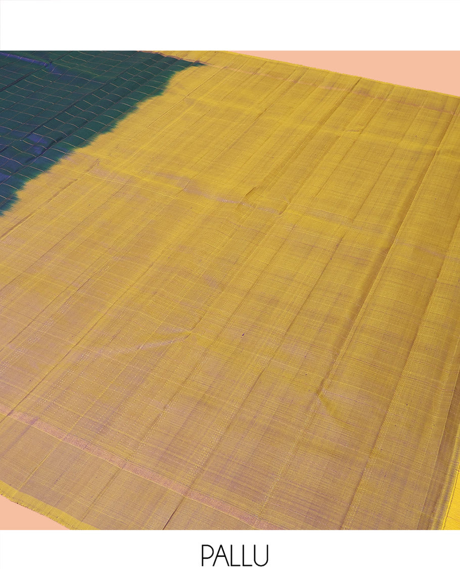 Blue Kanchipuram Silk Saree Delicately Woven with Checks, Complemented by a Contrast Border, Sparsely Zari Woven  Pallu, and Paired with a Contrast Blouse