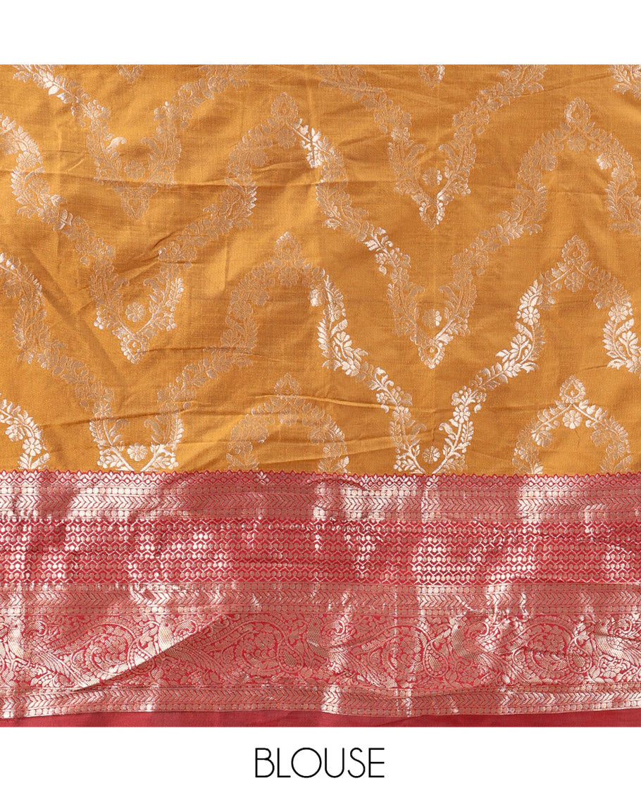 Mustard-Red Banarasi Half-Saree, Accentuated with Jacquard Design, a Contrast Traditional Zari Border, a Matching Blouse, and a Contrast Embroidered Dhavani