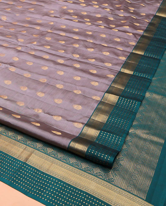 Grey Vasundhara Lite Silk Mix Saree, Adorned with Iruthalai Pakshi Buttas on Its Body, Complemented by a Contrast Border of Rekku, Muthu, Poun, and Jaal Designs, Grand Jaal Pallu, and Paired with a Contrast Blouse