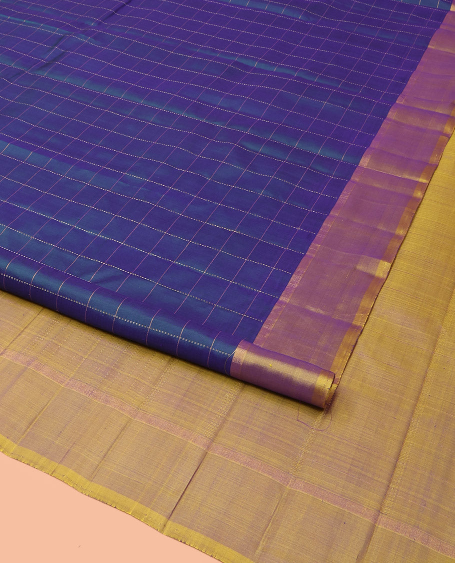 Blue Kanchipuram Silk Saree Delicately Woven with Checks, Complemented by a Contrast Border, Sparsely Zari Woven  Pallu, and Paired with a Contrast Blouse