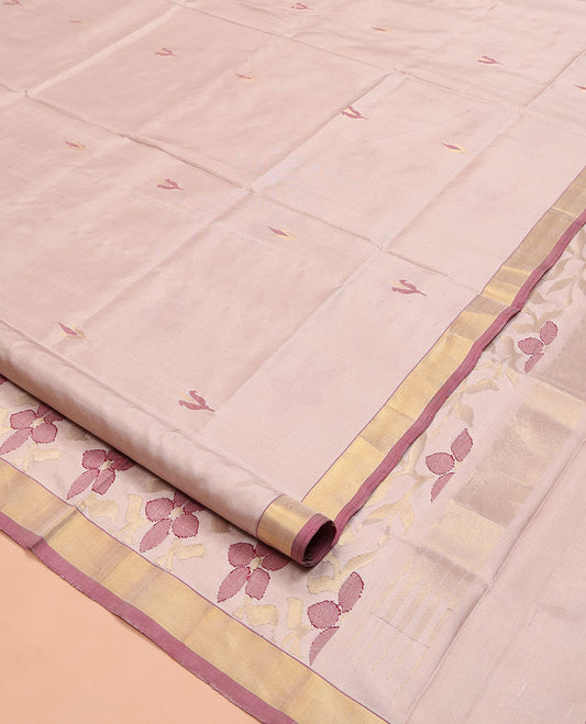 Light Sandal Uppada Silk Saree, Sparsely Woven with Floral Buttas on Its Body, Highlighted by a Contrast Zari Bavanji Border, Pallu of Floral Designs, and Paired with a Matching Blouse