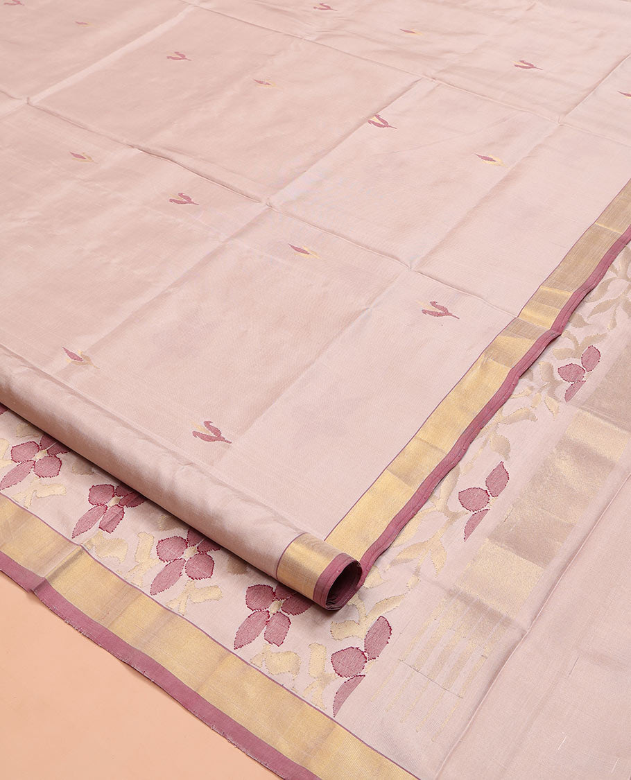 Light Sandal Uppada Silk Saree, Sparsely Woven with Floral Buttas on Its Body, Highlighted by a Contrast Zari Bavanji Border, Pallu of Floral Designs, and Paired with a Matching Blouse