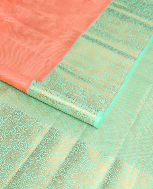 Peach striped vasundhara elite silk saree with contrast floral zari design border & chevron design pallu