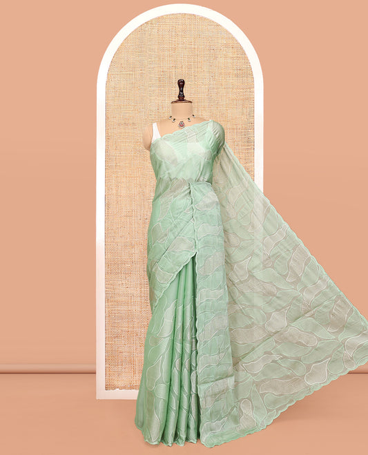 Pista Green Organza Saree, Subtly Enriched with Abstract-Style Embroidery, a Scallop Border, and a Matching Blouse