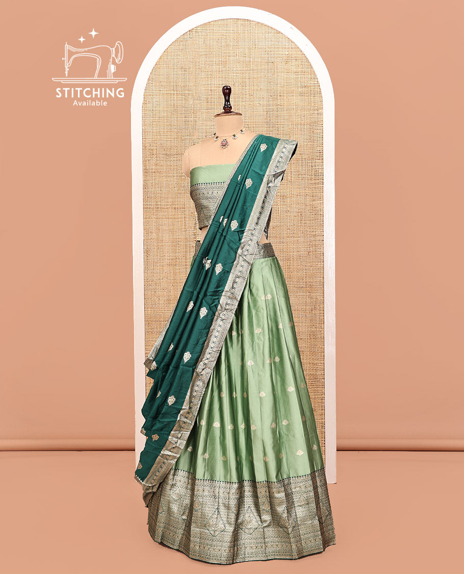 Green Art Silk Half Saree, Accentuated with Buttas Skirt, Contrast Traditional Border, Matching Blouse, and a Contrast Banaras Dhavani