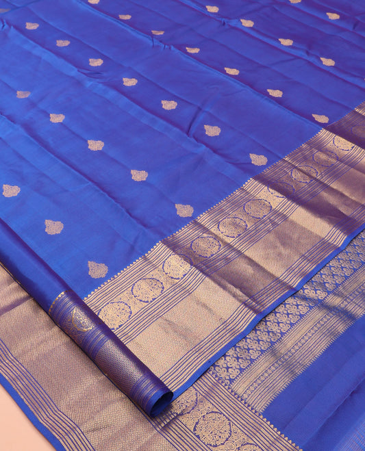 Blue Vasundhara Lite Silk Mix Saree, Finely Crafted with Zari Buttas, a Zari Border of Rekku, Banaras, Neli, Mayil Kann and Kodi Visiry, Grand Pallu, and a Matching Blouse