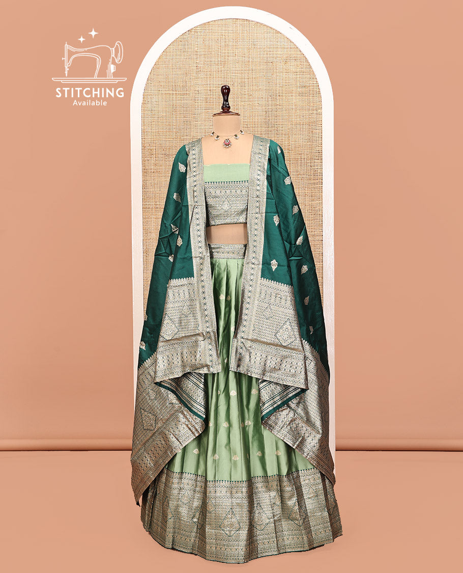 Green Art Silk Half Saree, Accentuated with Buttas Skirt, Contrast Traditional Border, Matching Blouse, and a Contrast Banaras Dhavani