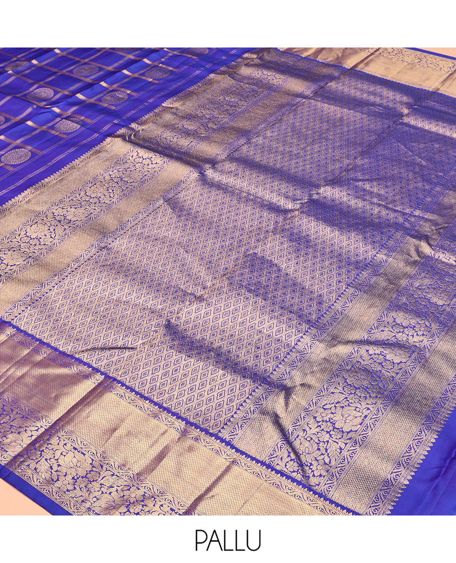 M.s Blue Vasundhara Silk Saree Features Zari Butta Enclosed Checks, a Zari Border of Mayil Kann and Kodi Visiry, Jaal Pallu, and Comes with a Matching Blouse