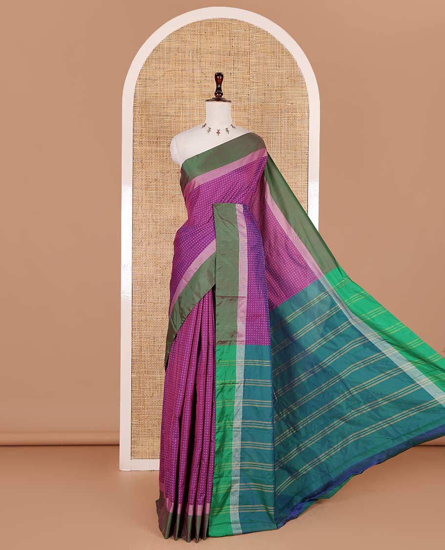 Purple-mehendi green plus-shaped buttas steeped semi-soft silk saree, contrast satin border of stripes, striped pallu, and contrast blouse