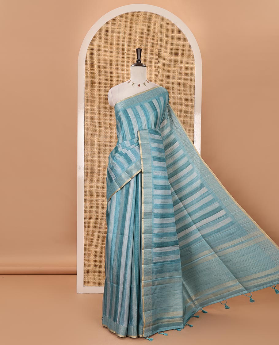 Rama blue hand brushing-style vertical stripes printed fancy tussar silk saree, zig zag-style zari woven border, zari pallu & striped blouse