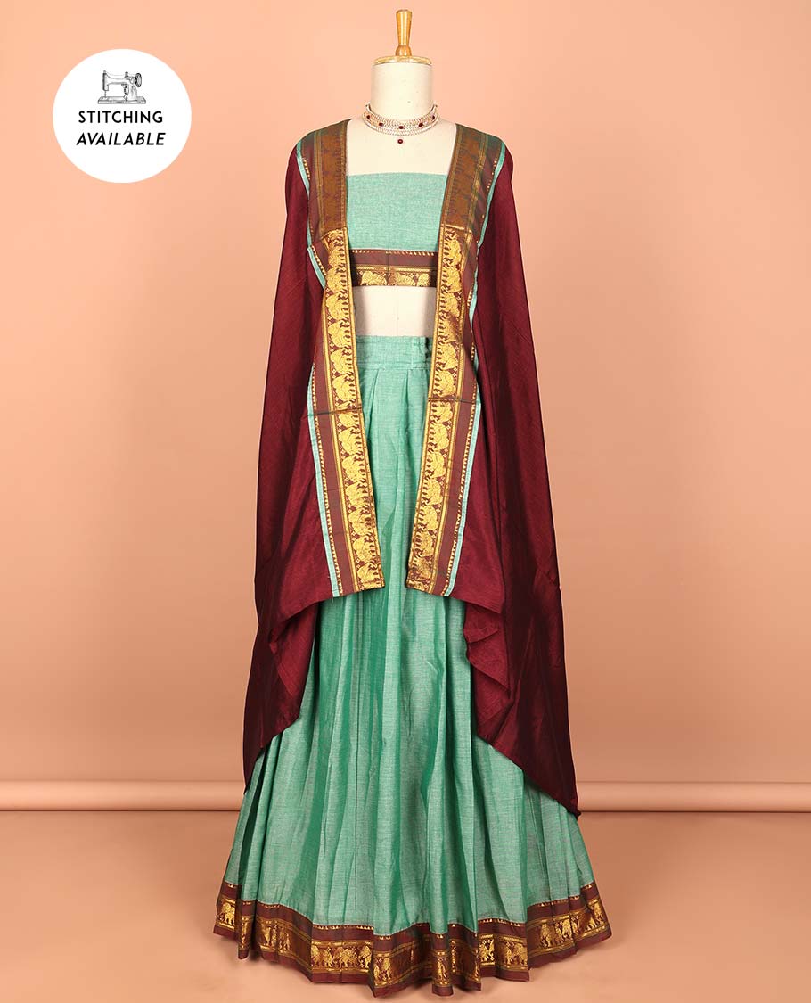 Blue cotton half saree with contrast zari border, plain blouse & plain with zari border dhavani