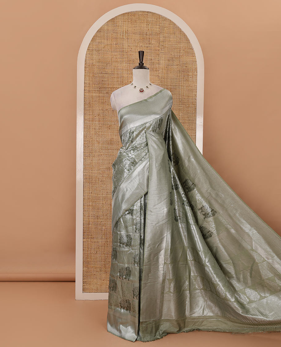 Green floral & elephant jacquard softy saree, diamond design zari border, intricate pallu & matching jacquard blouse