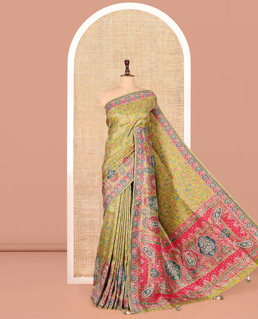 Green Dola Silk Saree, Elevated with Floral and Paisley Design on Its Body, Highlighted by Intricate Mughal Border, Pallu of Floral and Paisley Design, and Paired with a Matching Blouse