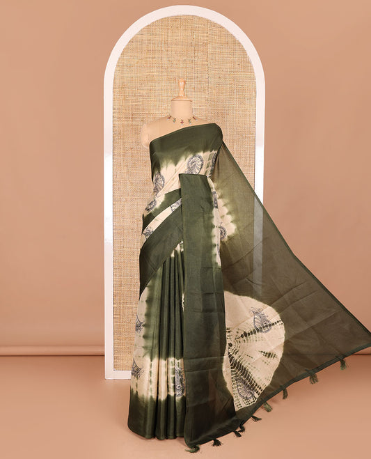 Borderless green shibori printed with shell motifs, blockprinted Manipur tussar saree, shibori printed pallu, and a plain matching blouse