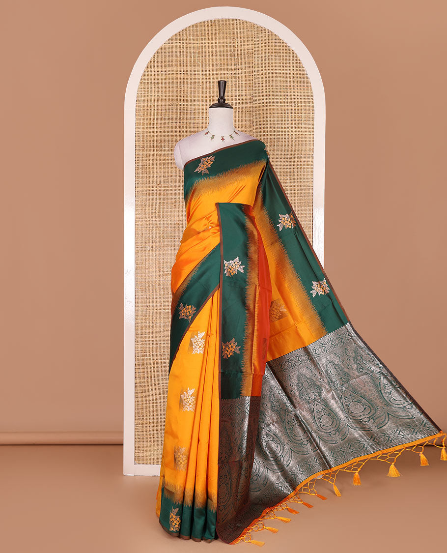 Yellow-green floral buttas elite soft silk saree, contrast floral buttas border, and pallu of Mughal-style intricate zari designs