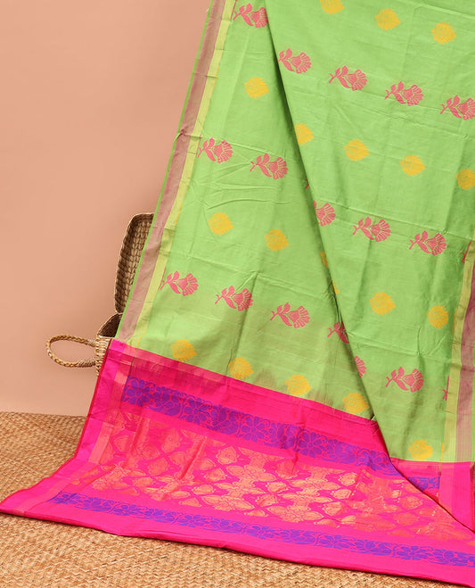 Parrot green kuppadam cotton saree with floral buttas, contrast plain border & pallu of intricate designs