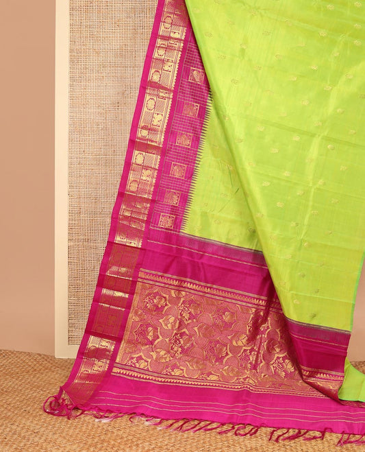 Green floral buttas kancheepuram silk saree with contrast floral design border & intricate zari design pallu