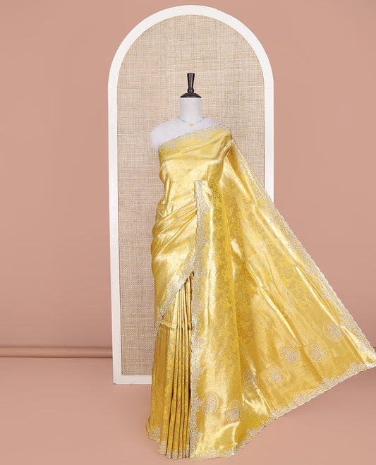 Yellow Designer Saree, Enriched with Floral Jaal Jacquard on Its Body, Highlighted by a Scallop Stone Embroidered Border, Majestically Detailed Pallu, and Paired with a Matching Blouse